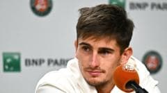 Cobolli through to French Open final as Arnaldi withdraws with virus