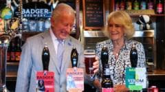 'Good day to drown a few sorrows,' says King as he pours pint